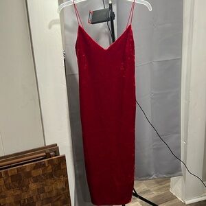 Red dress, velvet like material, fitted minimal stretch. Size Medium